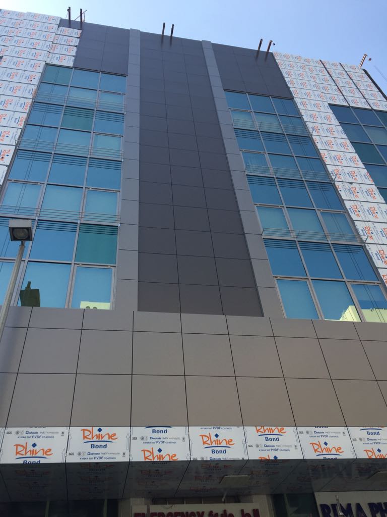 Architectural metal façade cladding installation