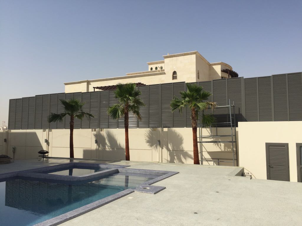 Large exterior architectural metal louver screen