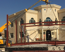 Steel installation team working on a building structure